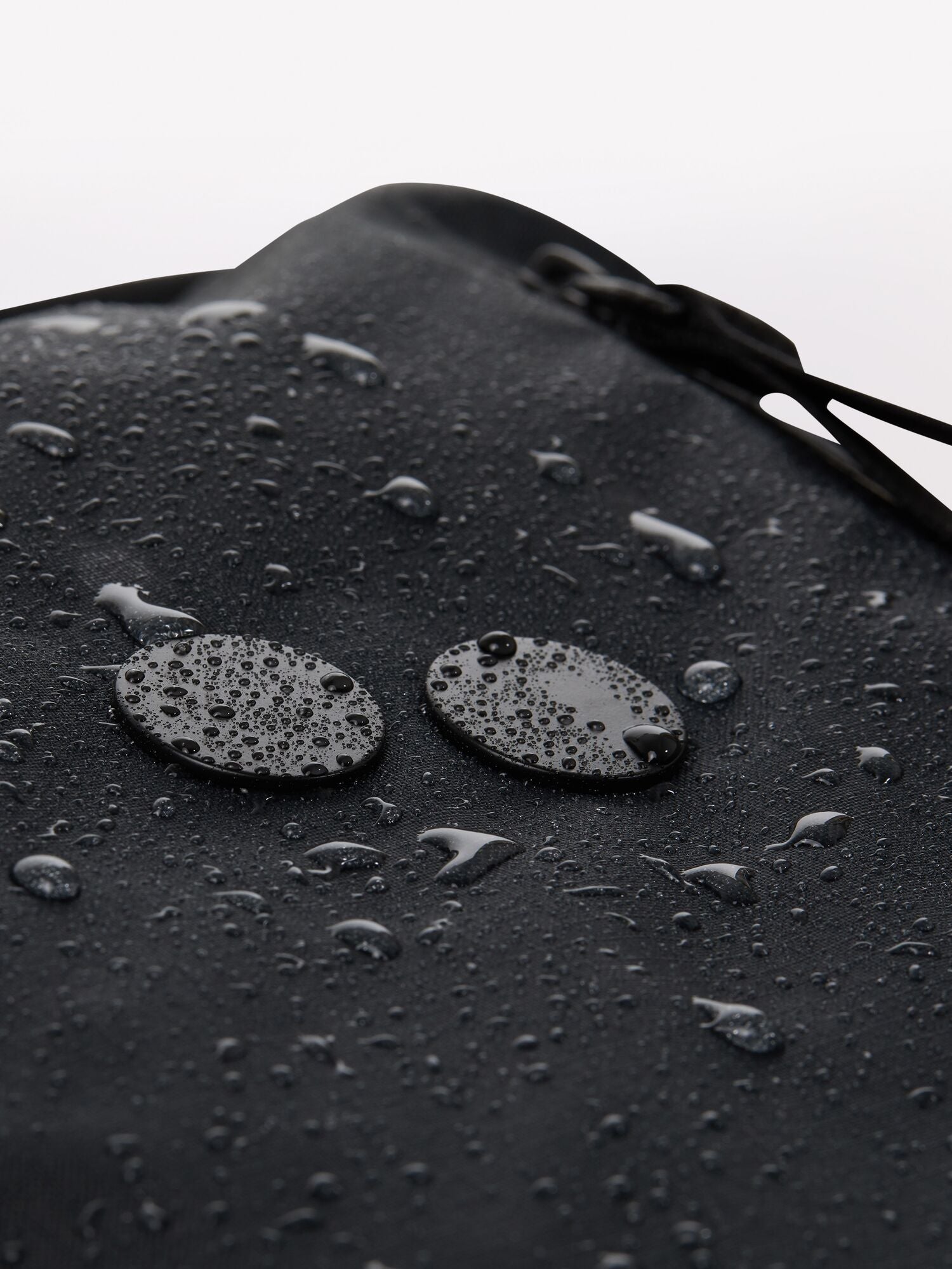 Pinqponq-Komut-Medium-Pure-Black-Water-Repellent