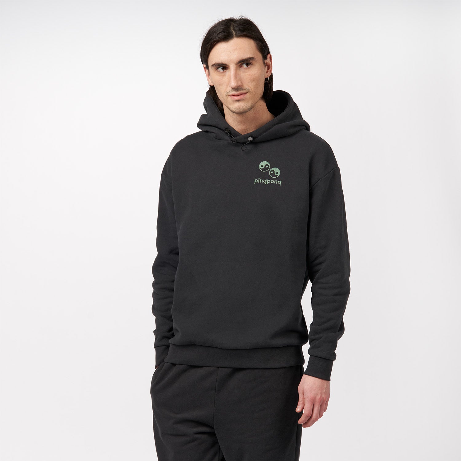 pinqponq-Hoodie-Peat-Black-Yin-Yang-model-front