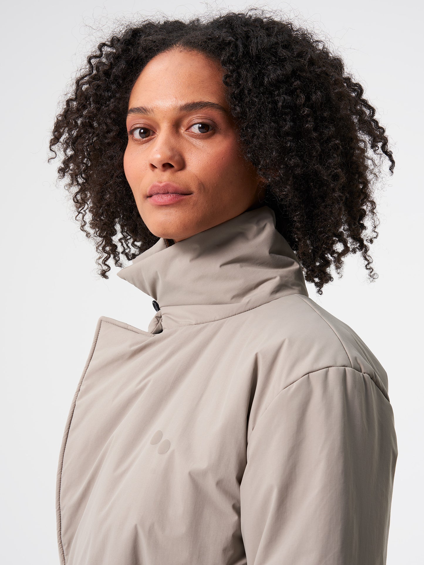 pinqponq-Padded-Trench-Coat-Cement-Taupe-model-side-detail