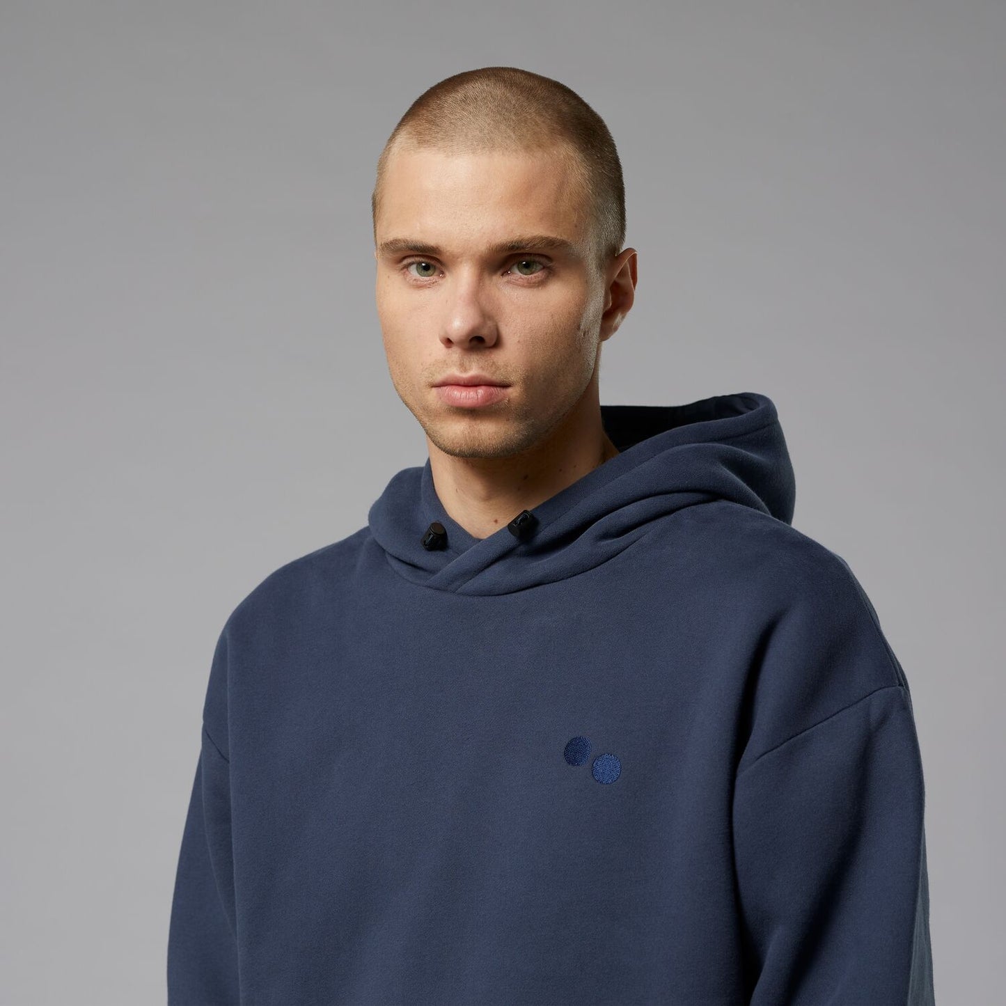 pinqponq-Hoody-Currant-Blue-unisex-model-front