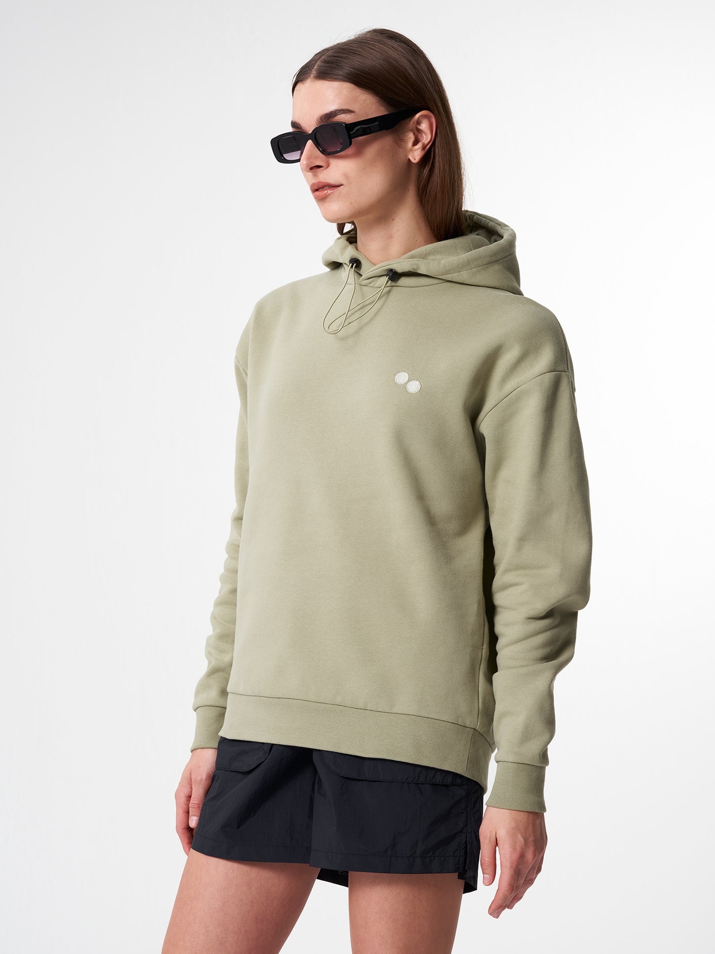 pinqponq-Hoodie-Unisex-Reed-Olive-model-front