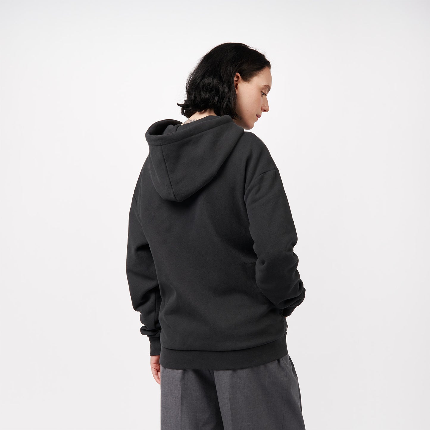 pinqponq-Zipped-Hoodie-Peat-Black-unisex-model-back