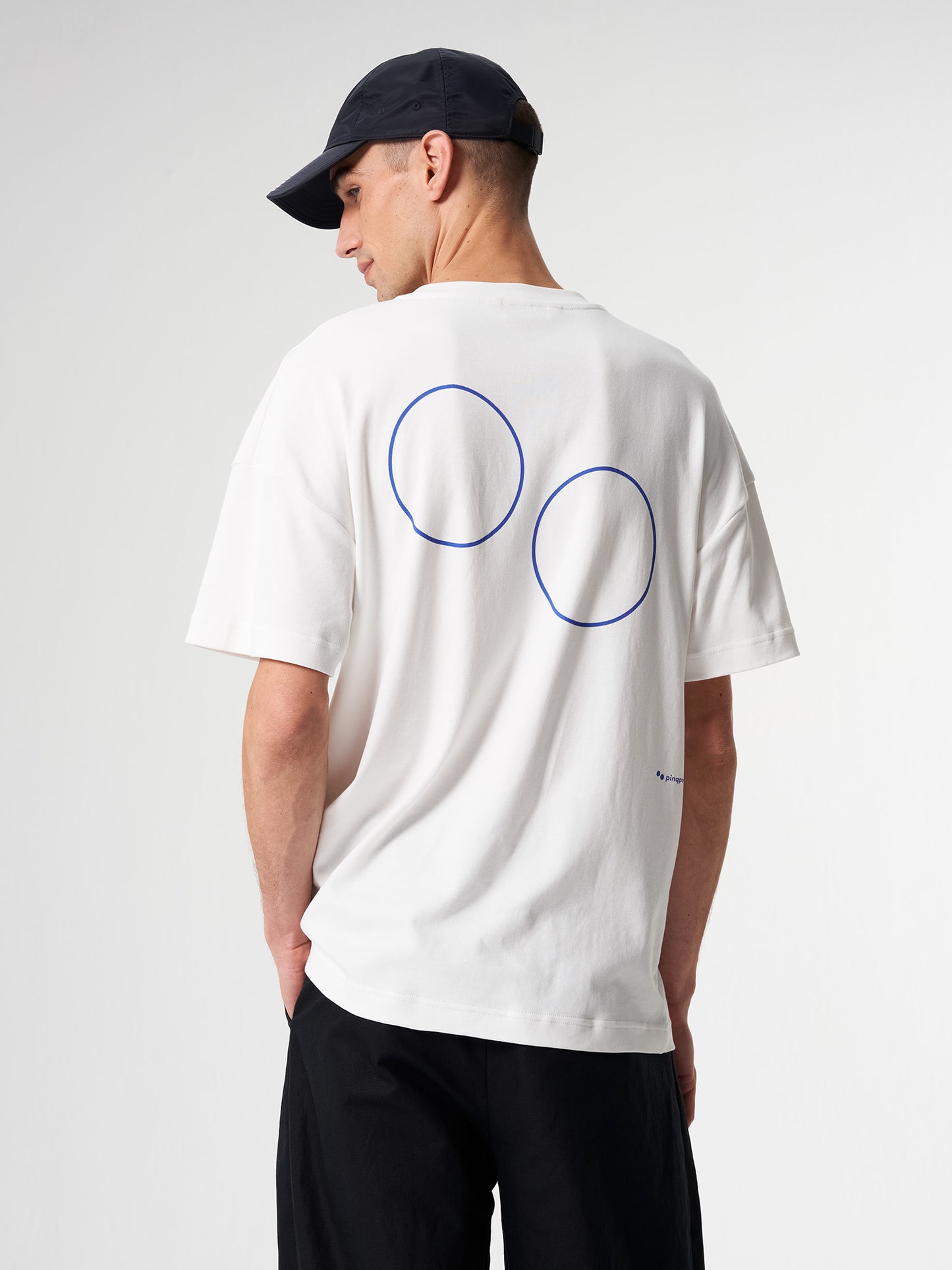 pinqponq-Tshirt-Unisex-Circles-Dandelion-White-model-back